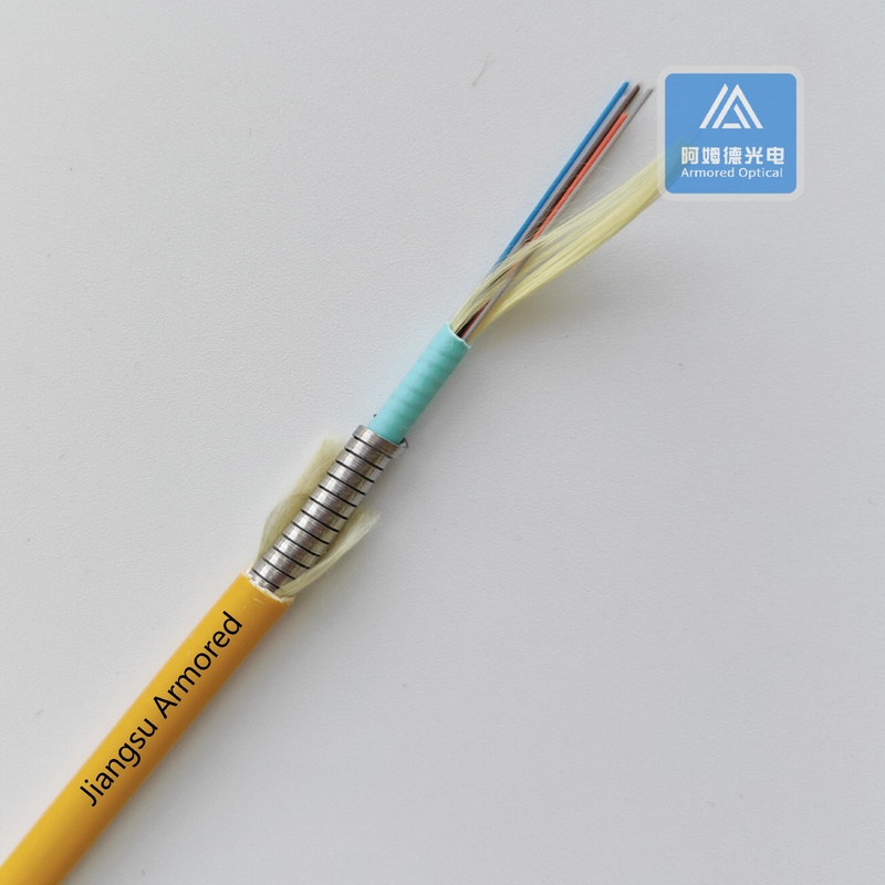 6 Cores Multi Mode Spiral Armored Fiber Cable 6.5mm Orange PVC Rodent Resistant FTTH Micro Armored Cable