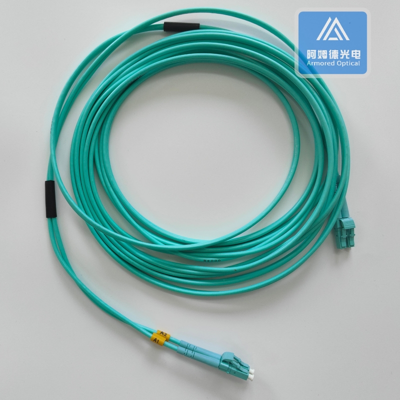 Duplex MM Armored Zipcord Patch Jumper 3.0mm x 2pcs Aque LSZH with DLC Connector